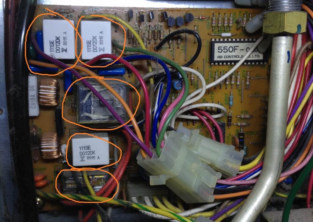 Photo of “MICRO COMPUTER PCB” with relays circled