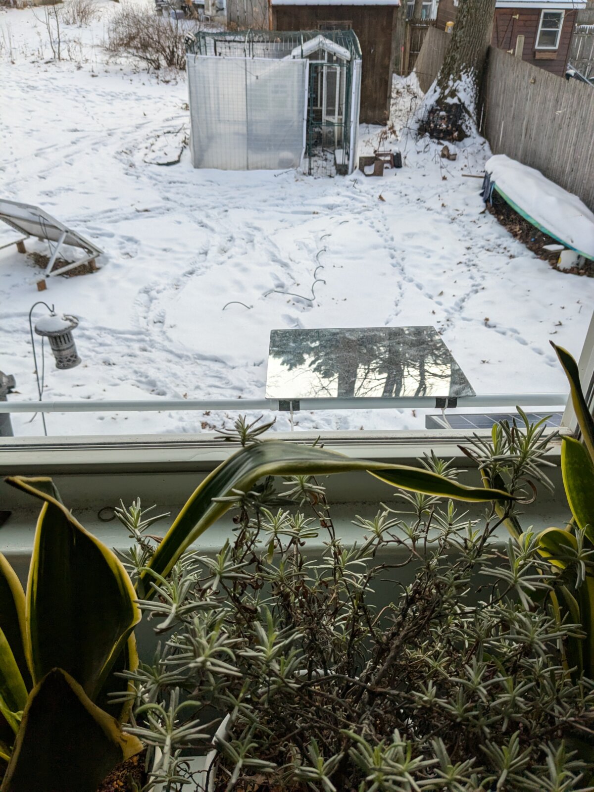 DIY Seasonal Mirror-Based Window Extender for Heat and Light